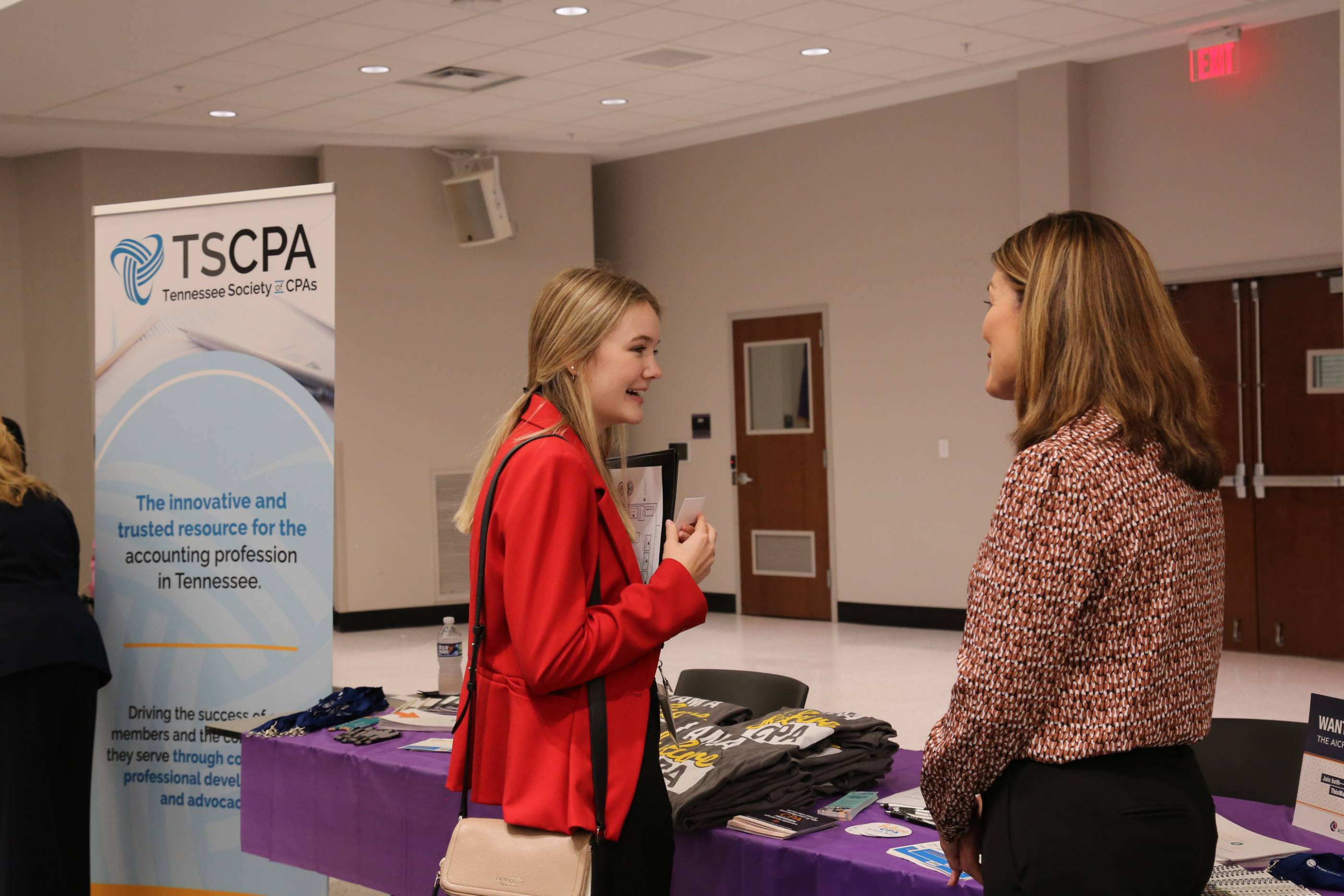 student speaking to employer