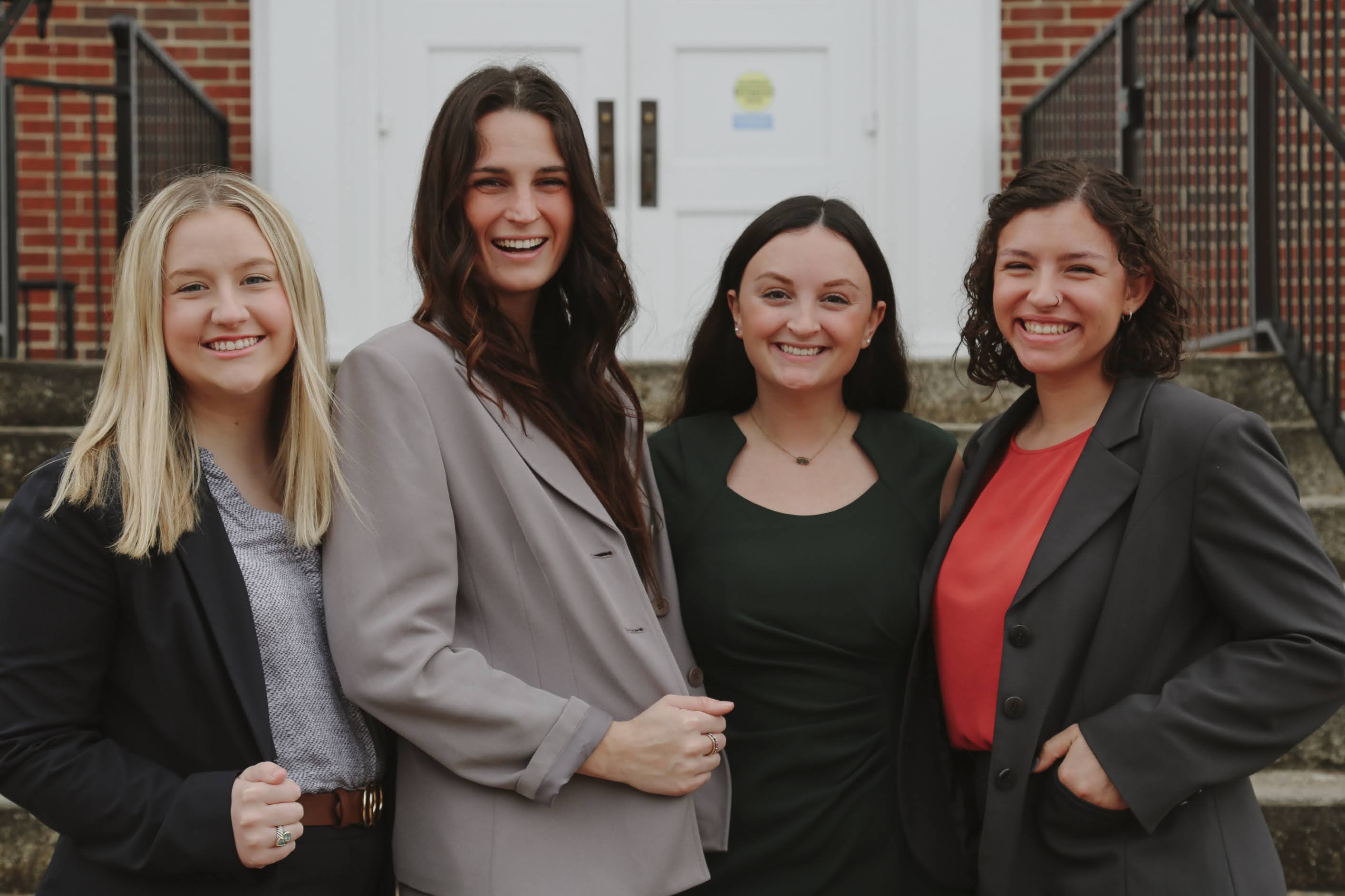 Group picture of students in business professional dress