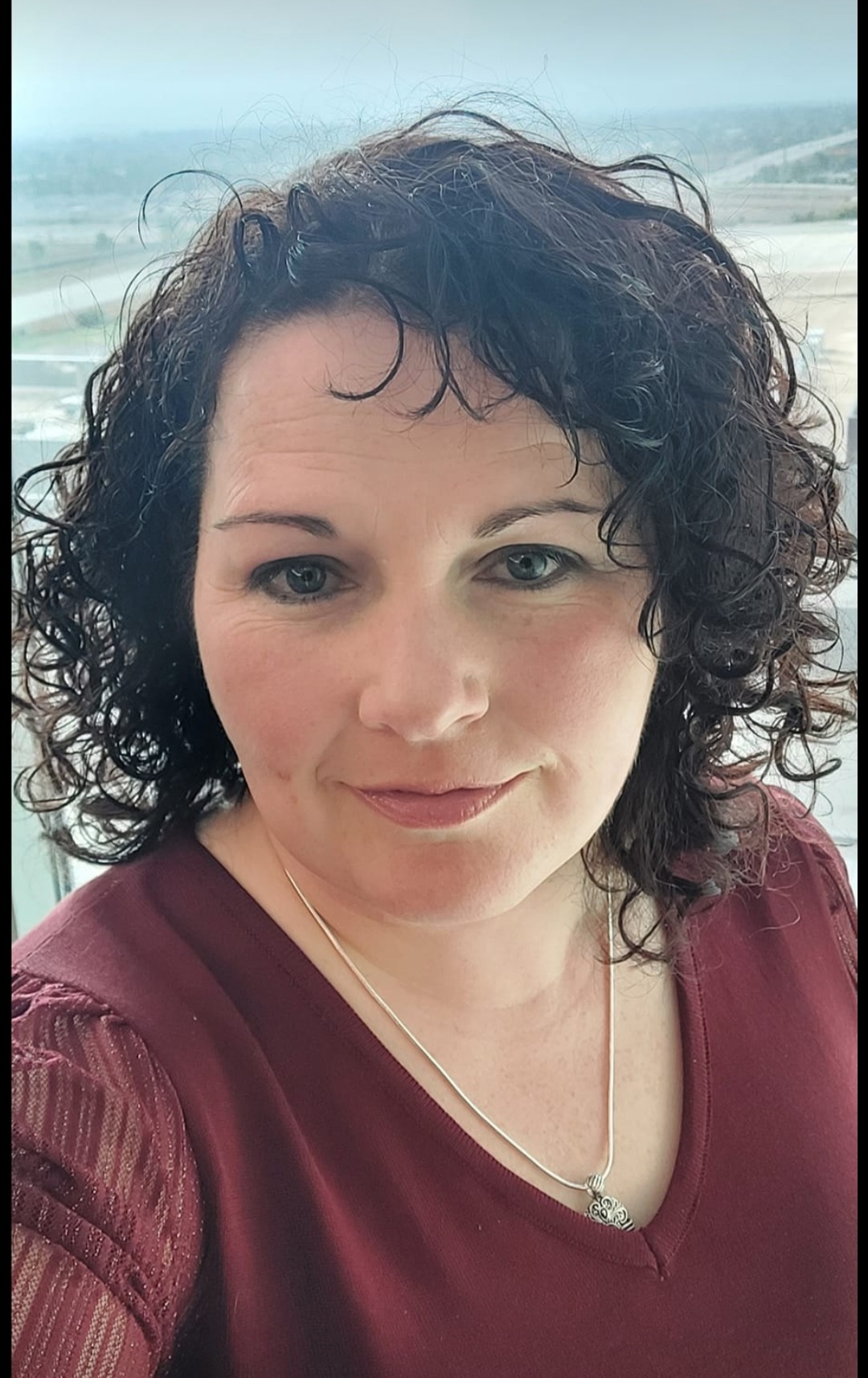 Headshot of Melanie Reynolds-Curtis