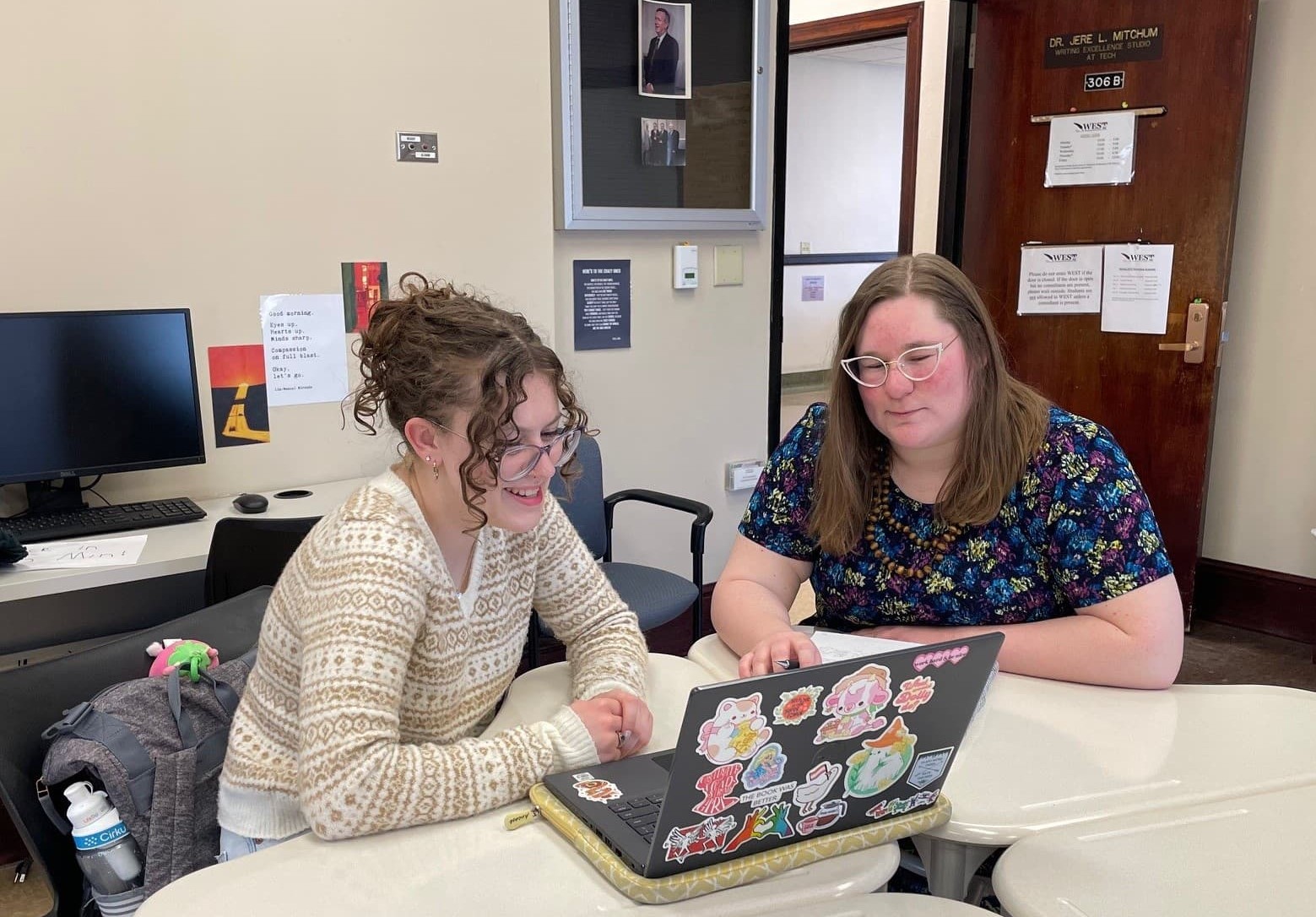 A WEST Consultant with a student.