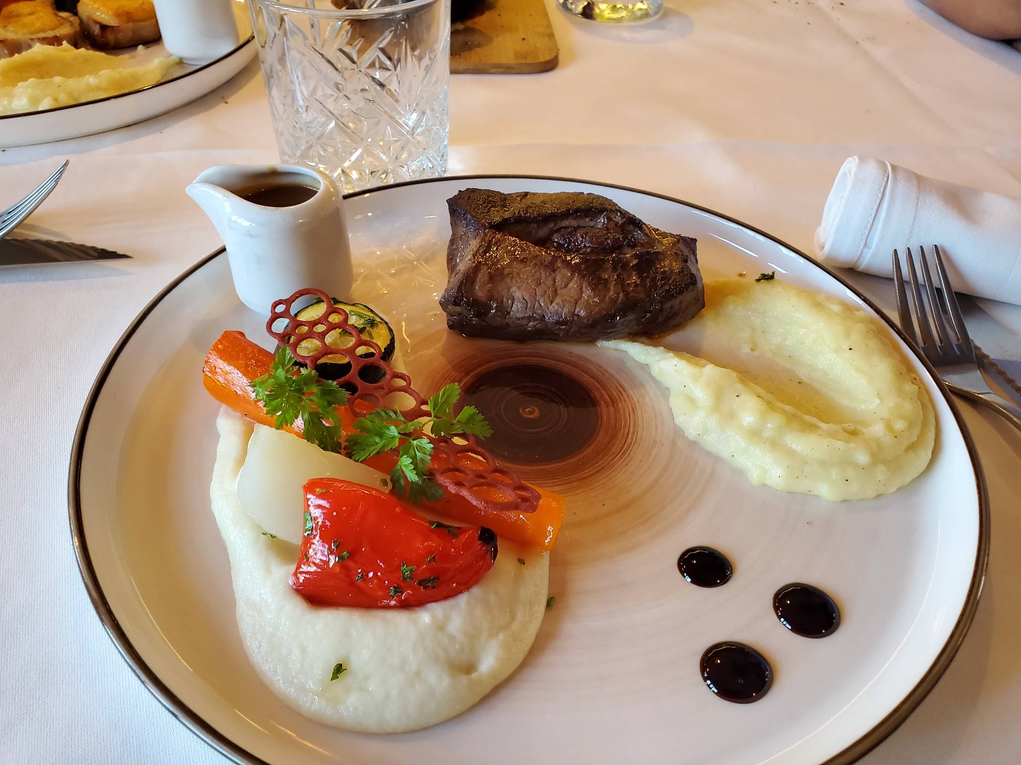 steak with mashed potatoes and roasted vegetables