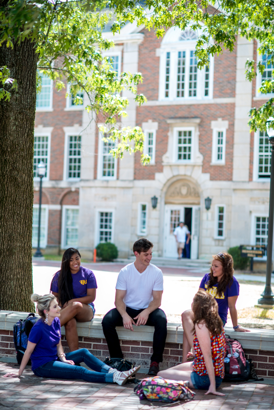 students sitting and talking