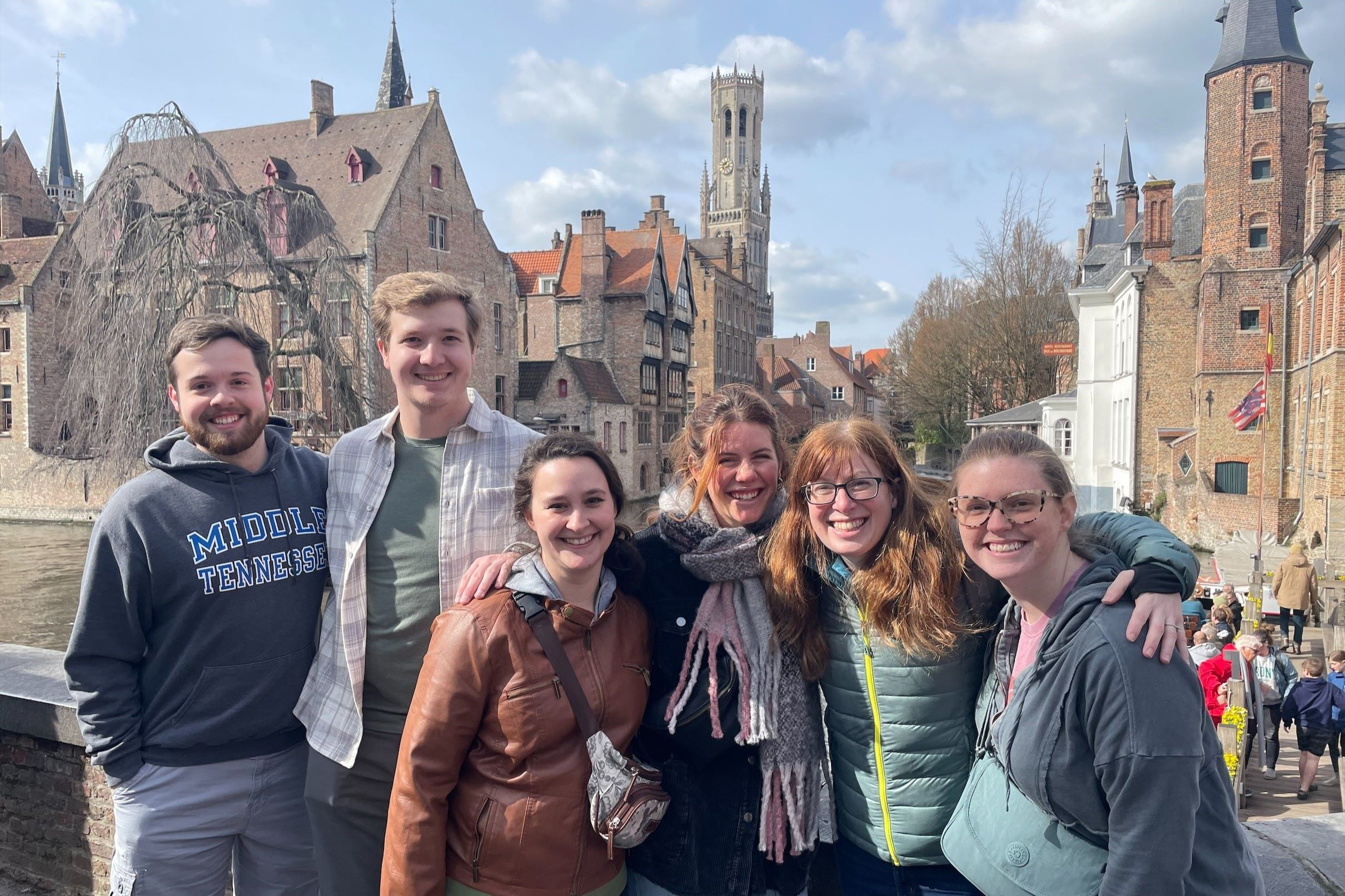 Dr. Lauren Michelle and students posing in Belgium