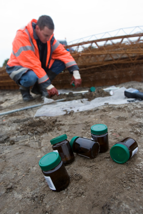 Man sampling with bottles