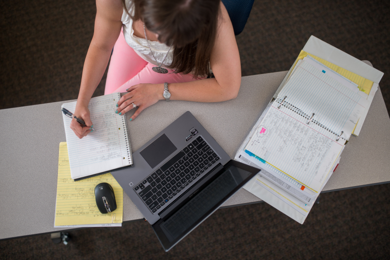 Girl taking notes