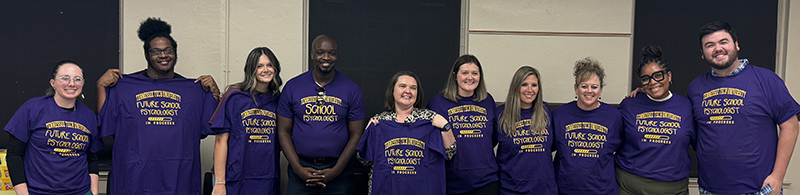 Ten happy school psychology students.