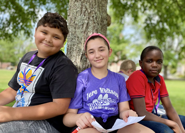 Scholars enjoy outdoor learning.