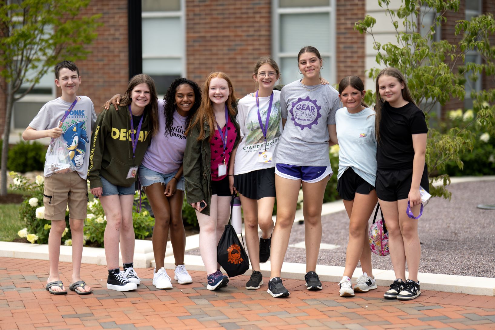 a group of students taking a photo outside