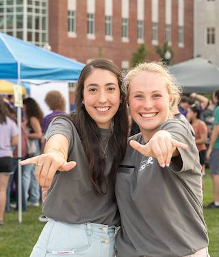 Students giving a Wings Up during the 2022 Mix & Mingle event.