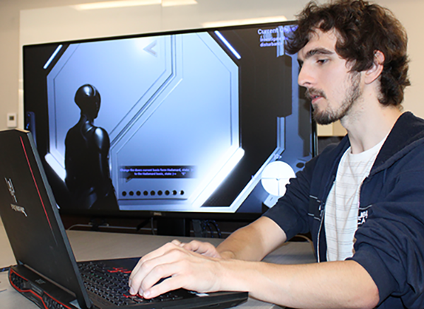 Computer Science student plays a quantum computing game he helped develop