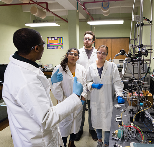 Chemical engineering students working in the lab