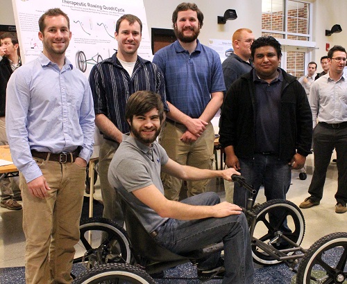 Students standing with their project