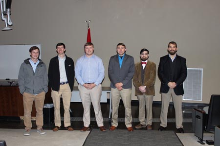 Students standing with their project