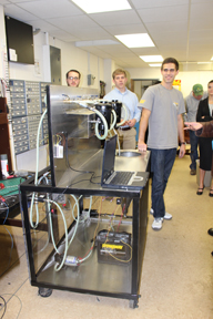 Students standing with their project