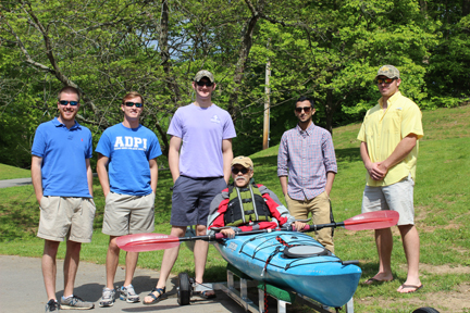 Students standing with their project