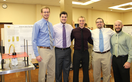 Students standing with their project