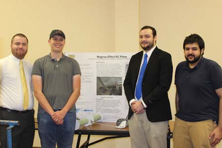 Students standing with their project