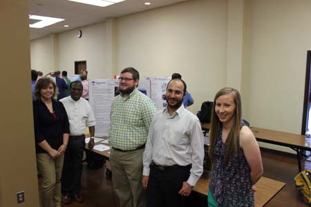 Students standing with their projects