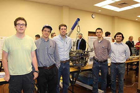 Students standing with their project