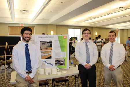 Students standing with their project