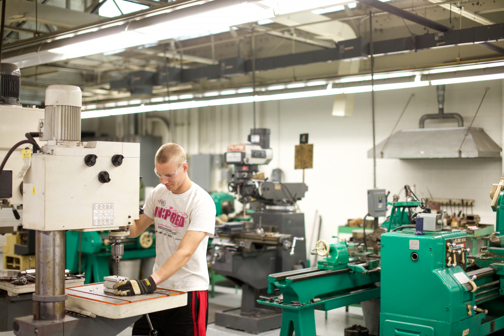 Student working in the machine shop