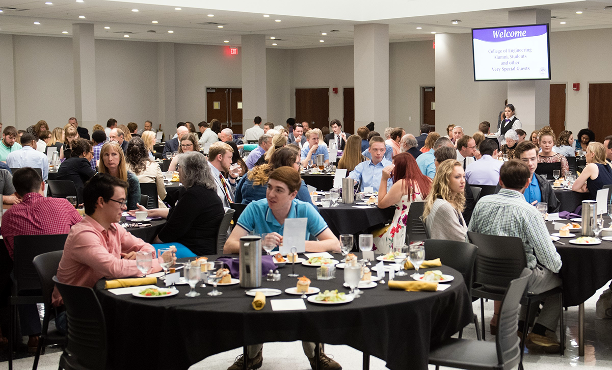 2018 scholarship banquet attendees sitting at tables waiting on food to be served