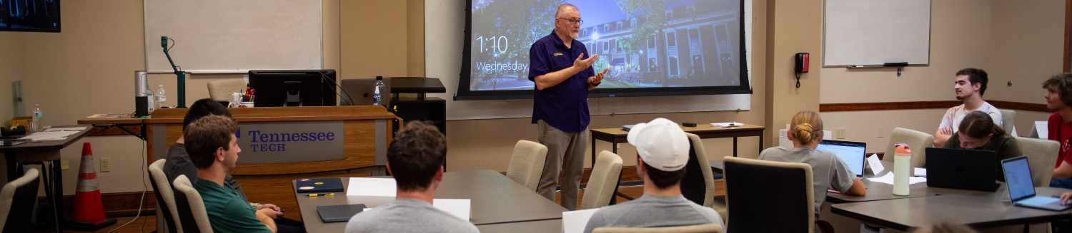 Professor teaching students