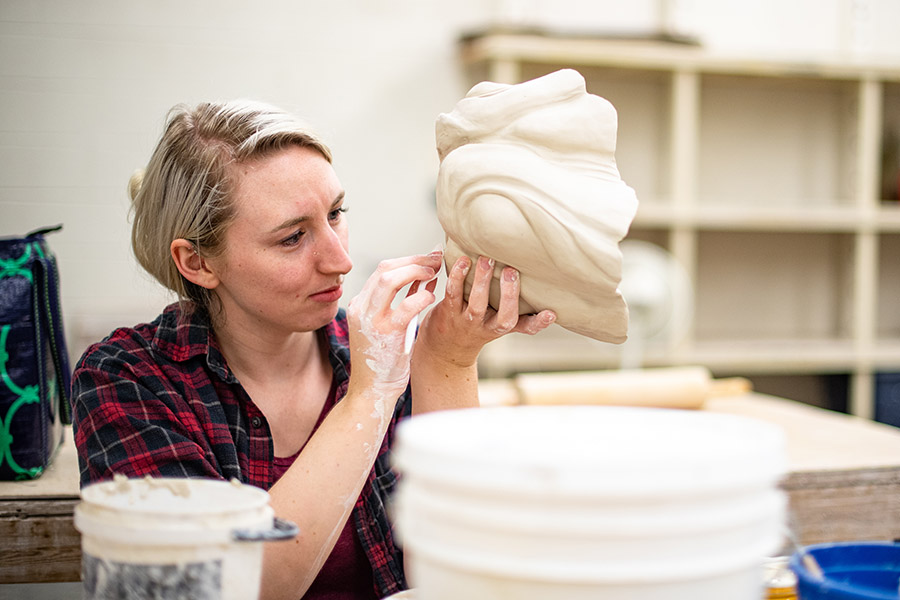 A student working in the Clay Studio.