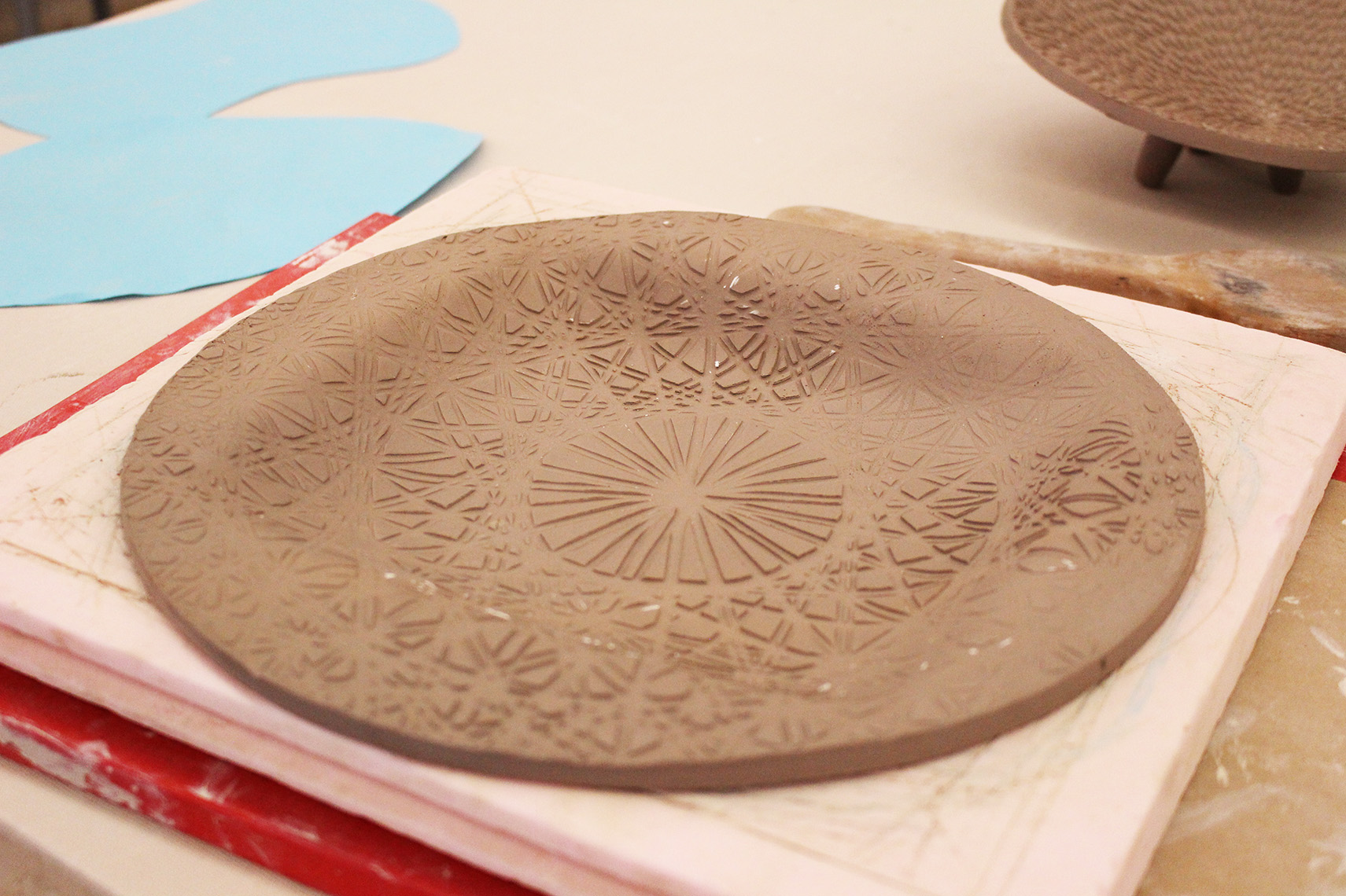 Clay serving tray being made