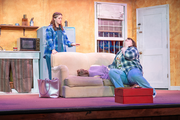 Somebody Nobody play: lolli wailing over Beverly, the agent after hitting her with a board