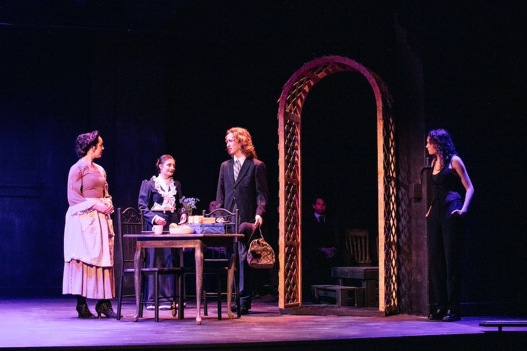 Emily Webb, Mrs. Webb, Mr. Webb and Stage Manager of Our Town on stage at the Backdoor Playhouse 