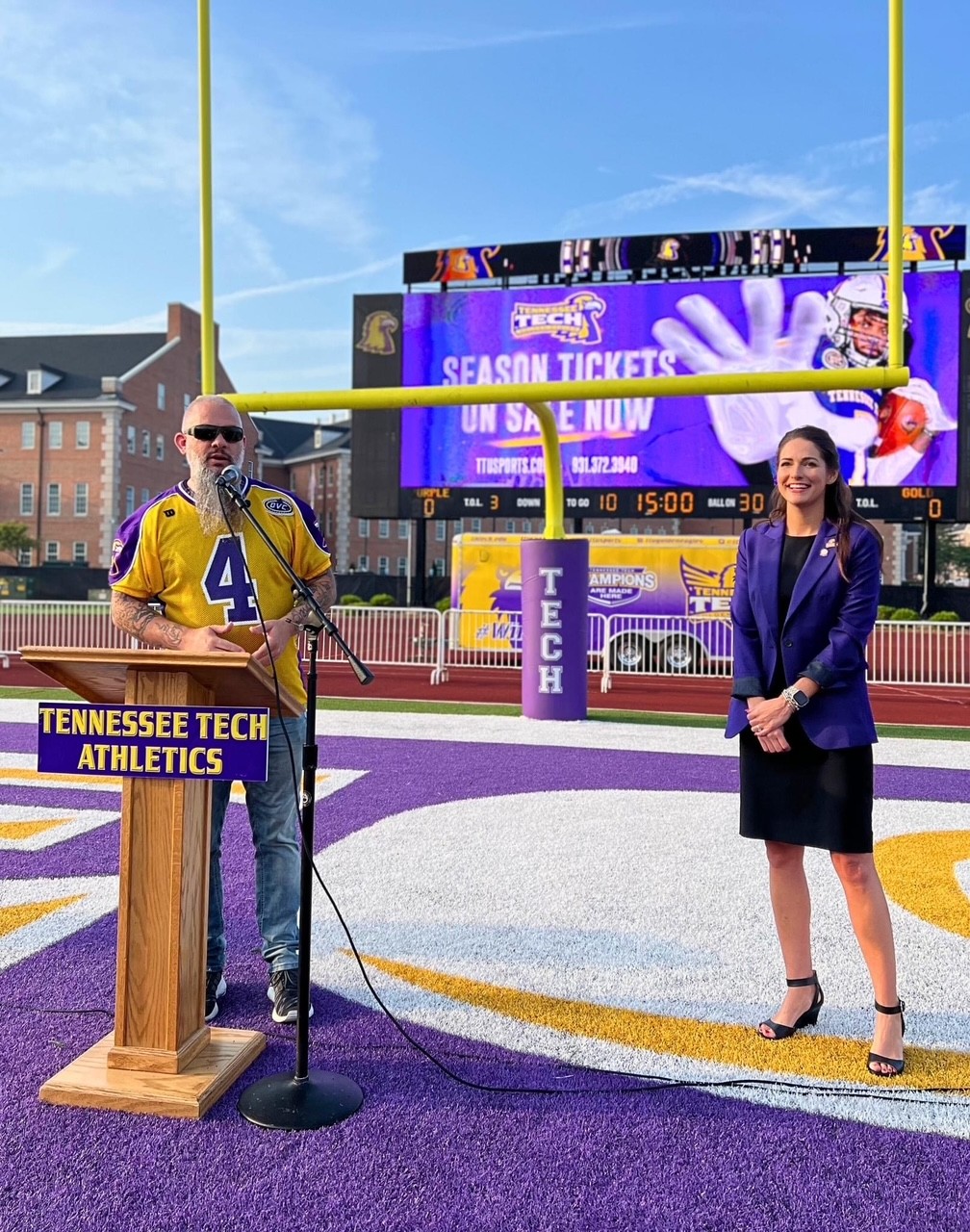 Amy New on tech fball field