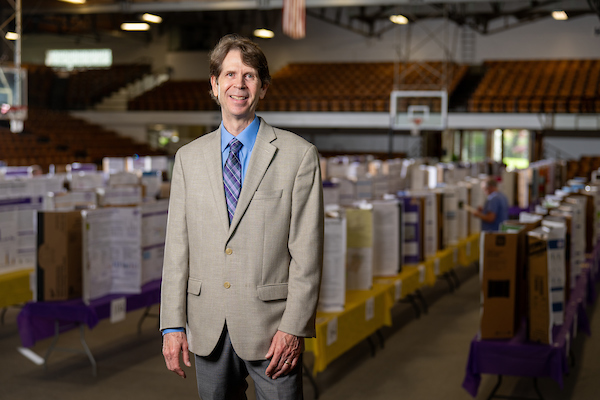 Hayden Mattingly, director and professor in the School of Environmental Studies, poses for the camera at an event.