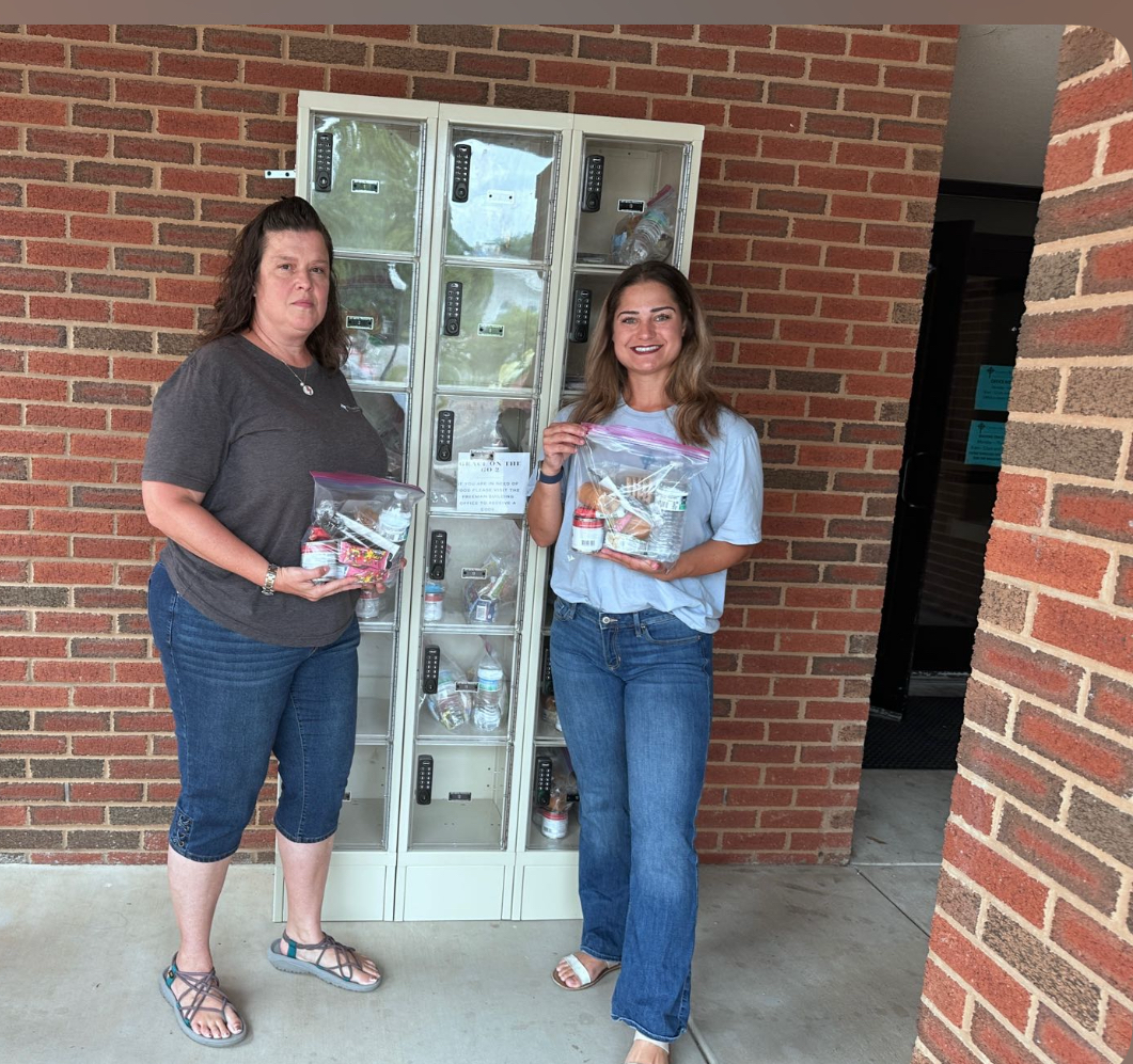 Krissie, the Assistant Director, with the Director of Servant Ministries
