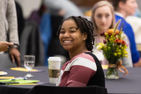 2019 women's conference, woman smiling