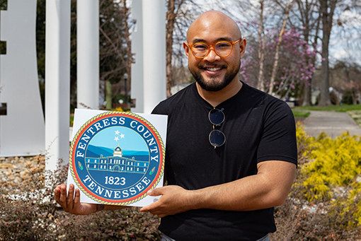 Jesse Filoteo, holding Fentress County seal design