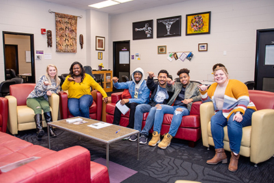 Students giving a Wings Up in the Black Cultural Center.