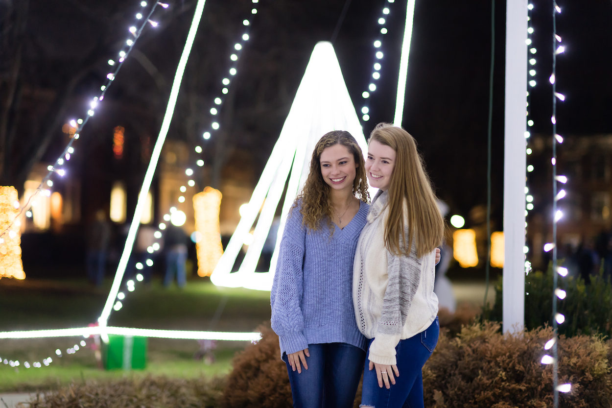 More than a thousand students drank hot chocolate, sang Christmas carols and got a free T-shirt to celebrate the third annual "Lighting the Quad" event on Tuesday night.