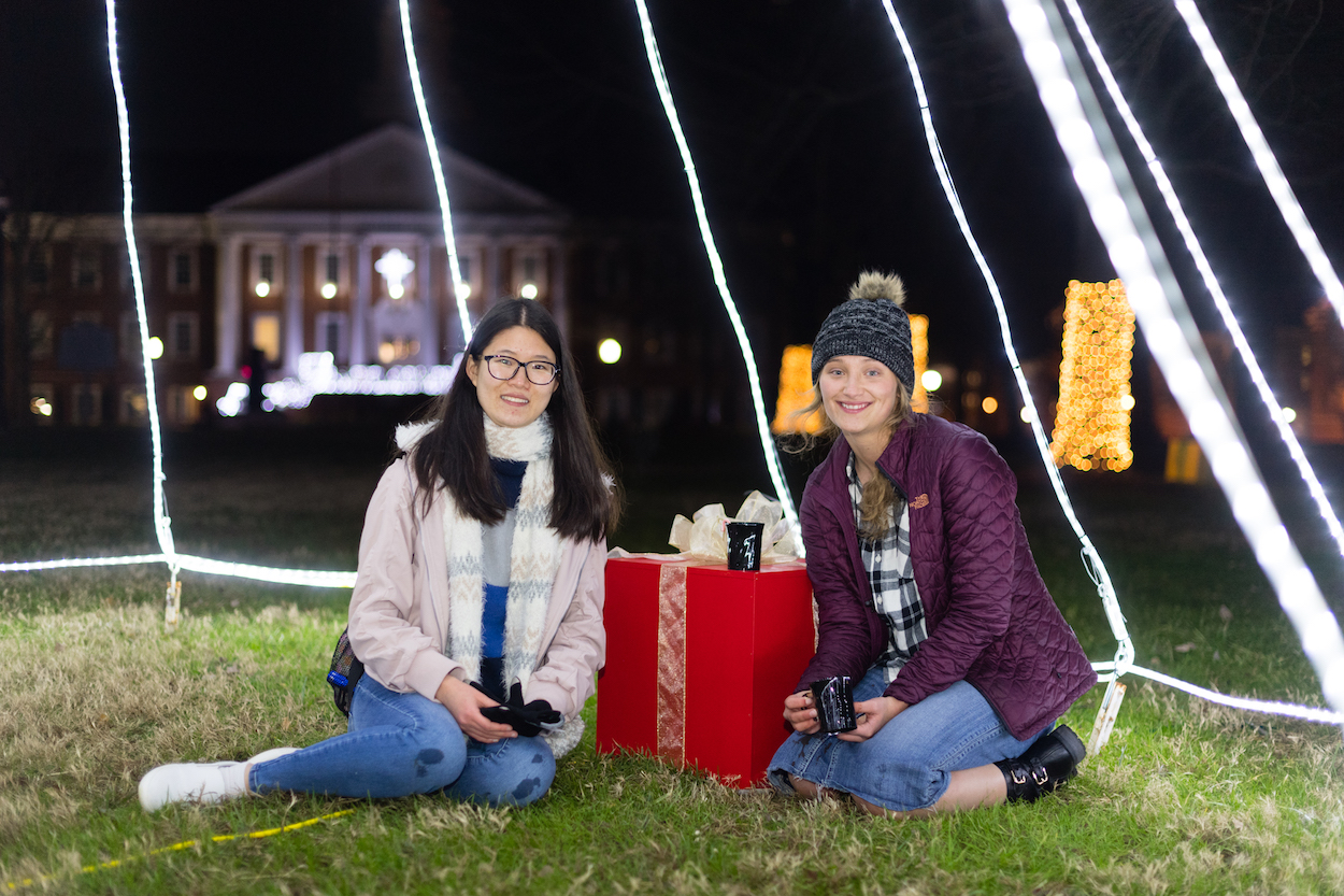 More than a thousand students drank hot chocolate, sang Christmas carols and got a free T-shirt to celebrate the third annual "Lighting the Quad" event on Tuesday night.