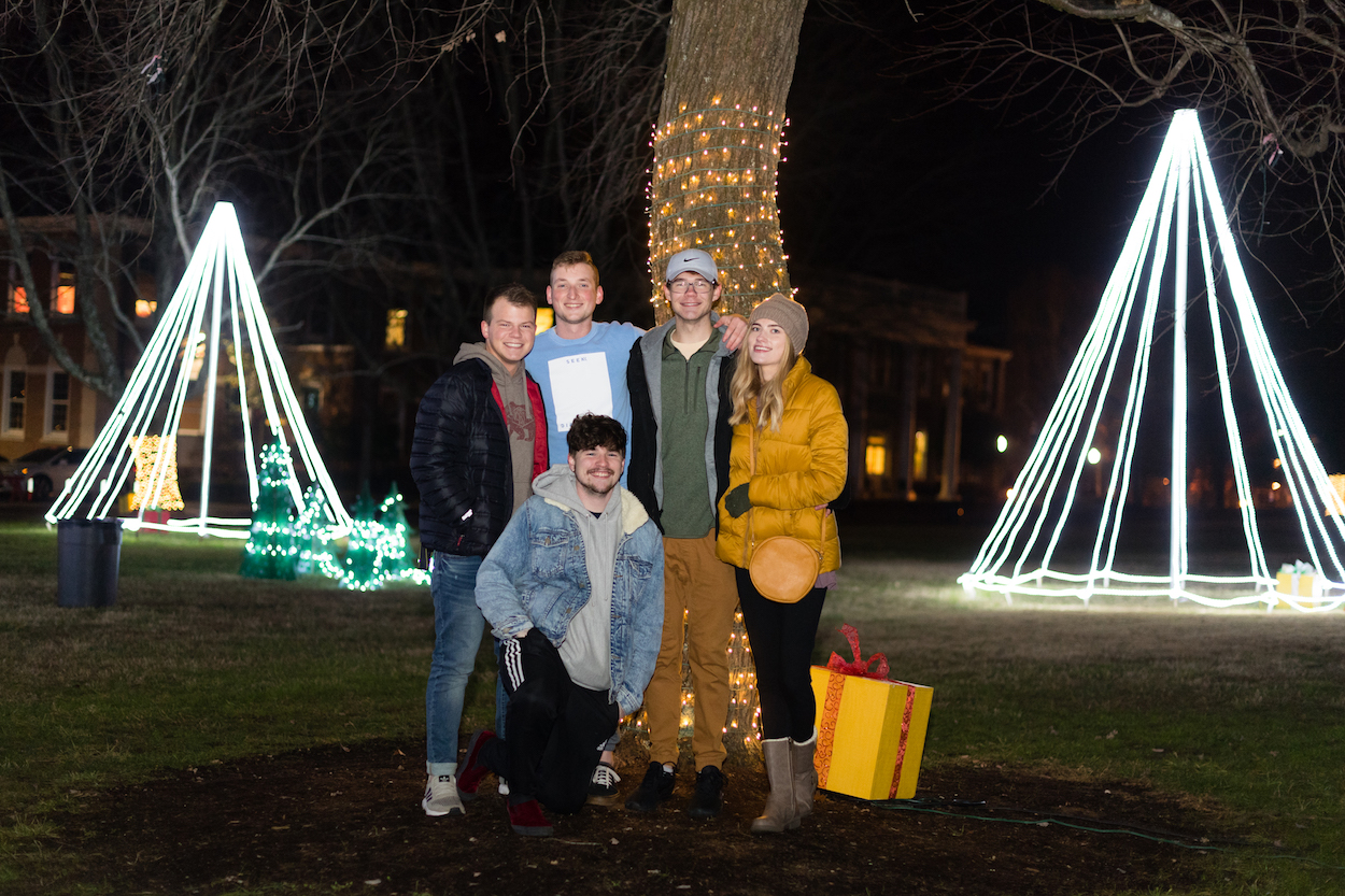 More than a thousand students drank hot chocolate, sang Christmas carols and got a free T-shirt to celebrate the third annual "Lighting the Quad" event on Tuesday night.