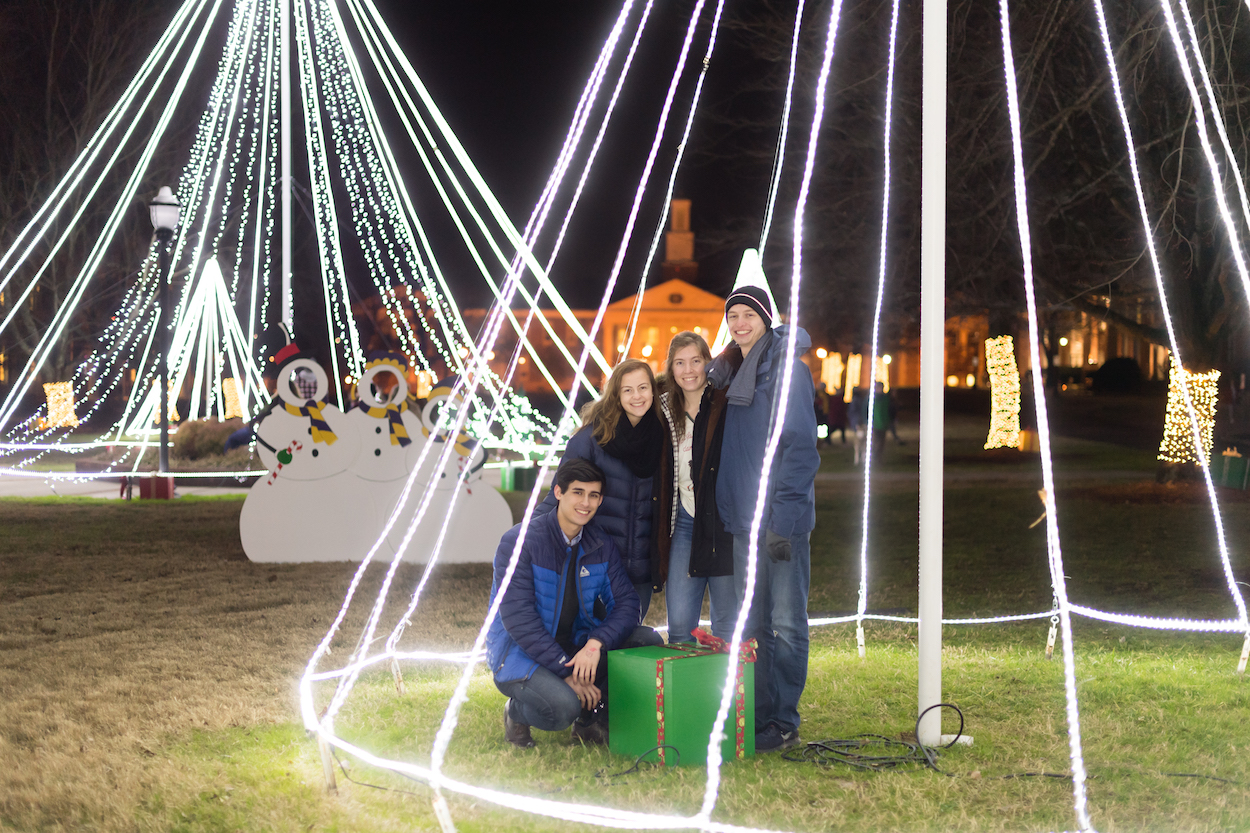 More than a thousand students drank hot chocolate, sang Christmas carols and got a free T-shirt to celebrate the third annual "Lighting the Quad" event on Tuesday night.