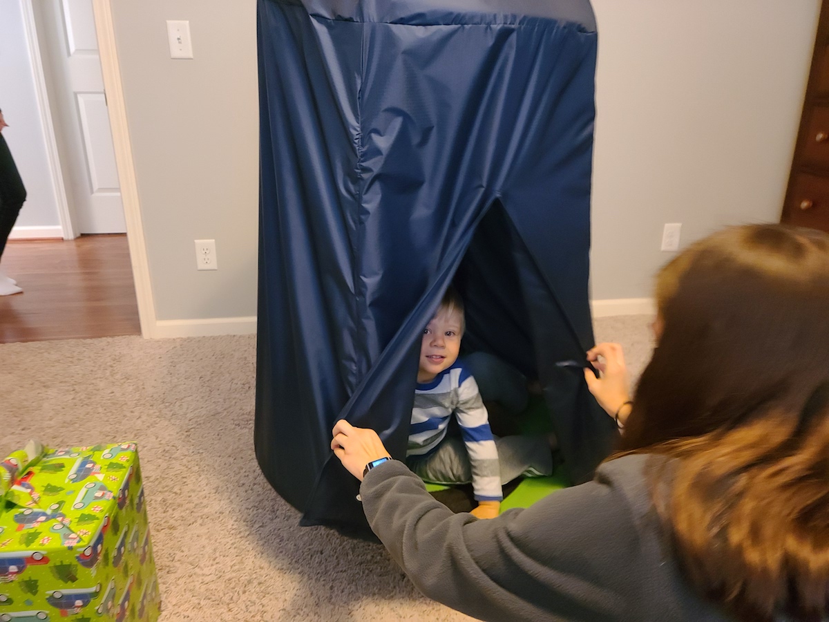 Aiden Robertson enjoys his sensory swing built by Tennessee Tech mechanical engineering students.