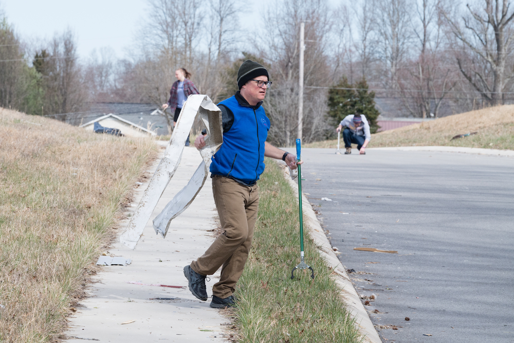 Tennessee Tech English instructor Andy Smith helps with volunteer efforts after an F-4 tornado touched down a few miles from campus.