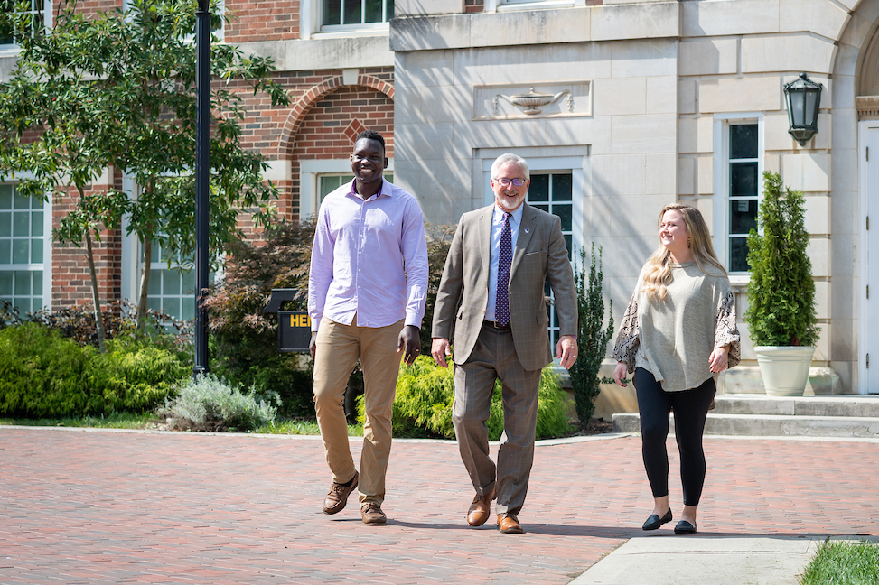 President Oldham with students