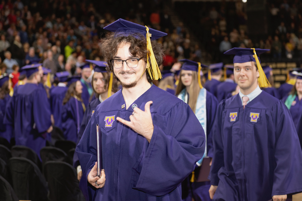Students walk through the Hooper Ebelen Center at Commencement Ceremonies