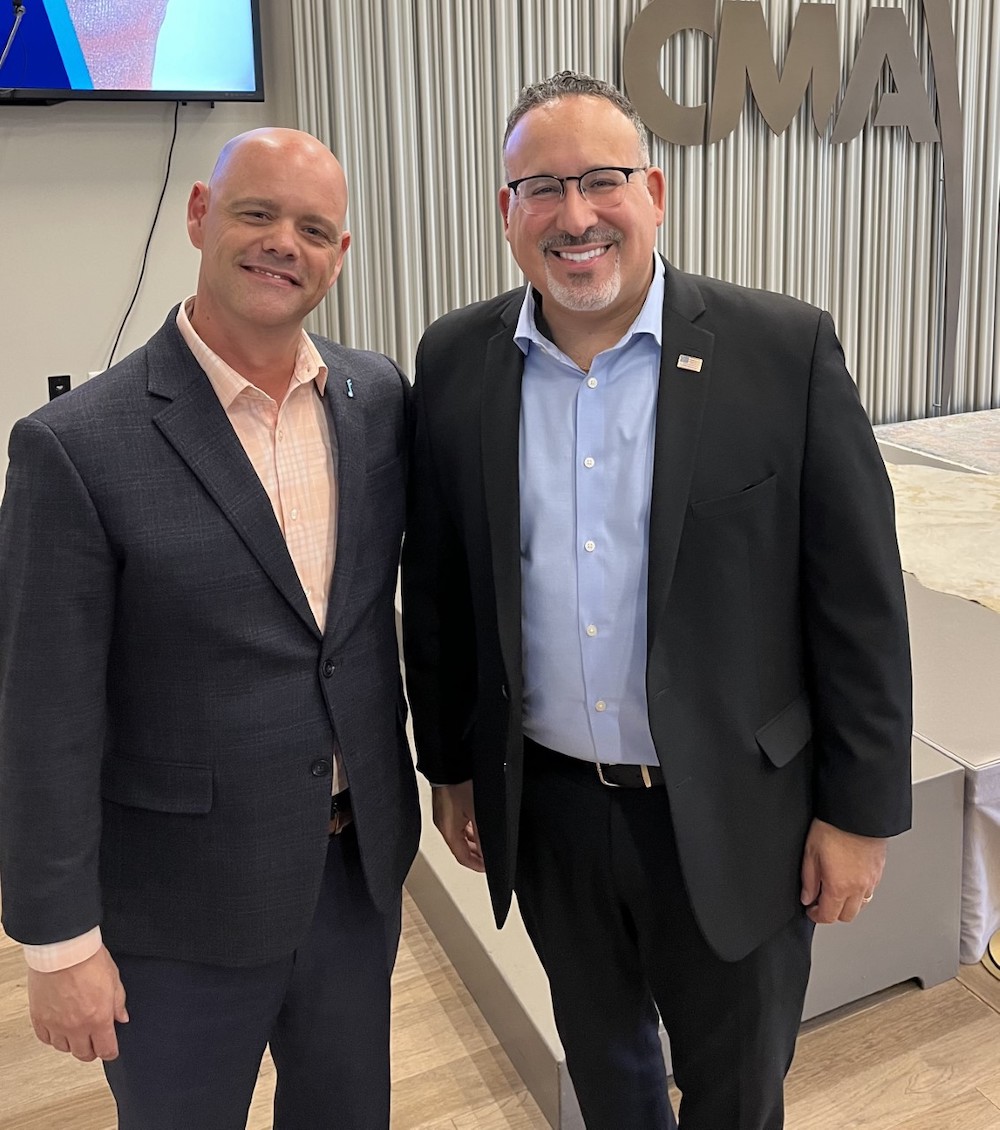 Andrew Lynn with U.S. Secretary of Education, Dr. Miguel Cardona 