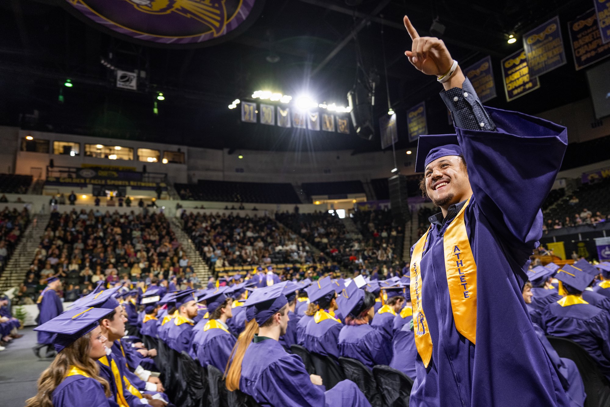 Erik Oliver, a Tech basketball player from Cheyenne, Wyoming, celebrates receiving his degree from the College of Interdisciplinary Studies. 