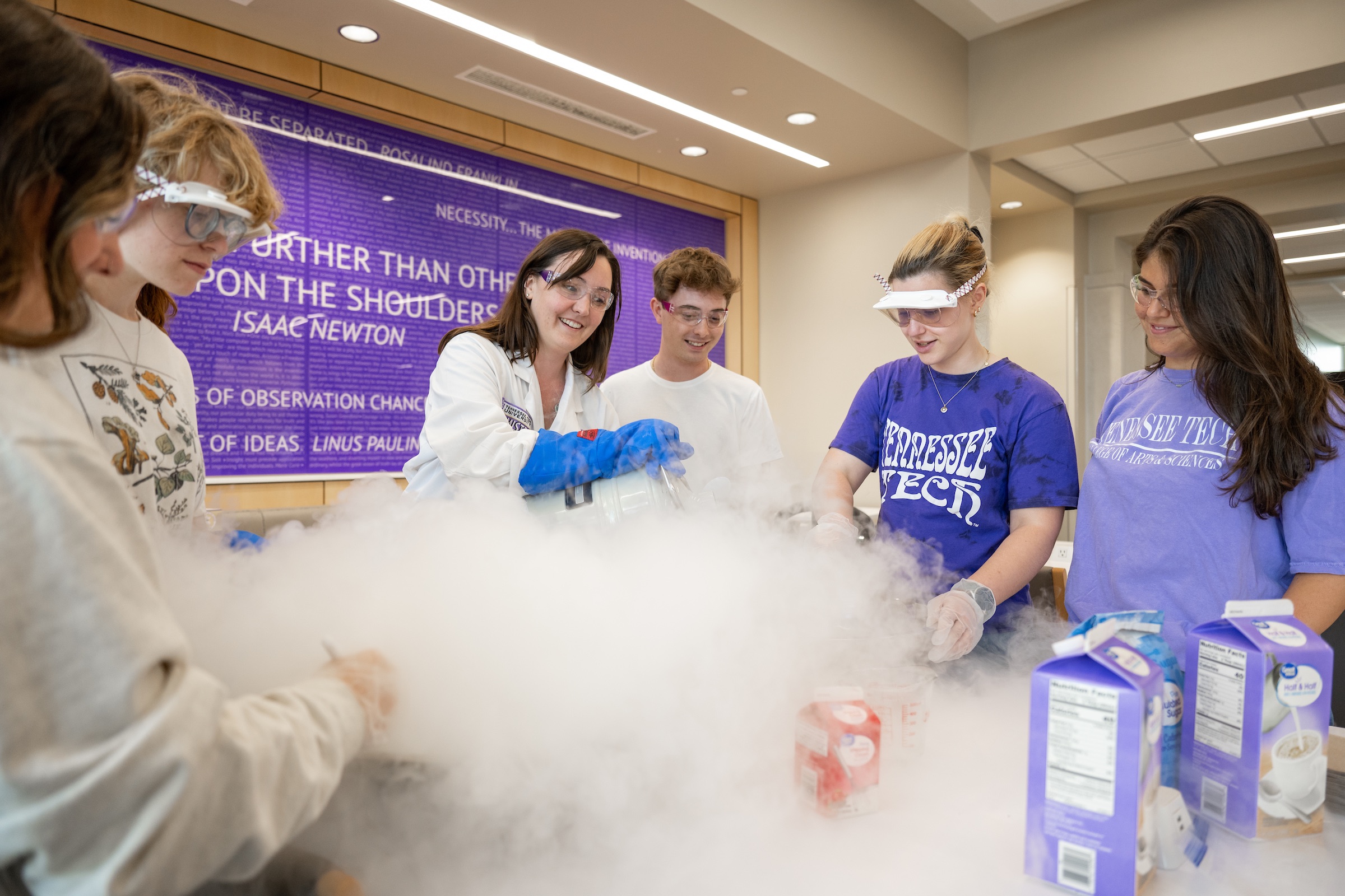 Assistant Professor of Chemistry Kristen Johnson, center, leads students in an experiment in Tech’s Lab Science Commons Building