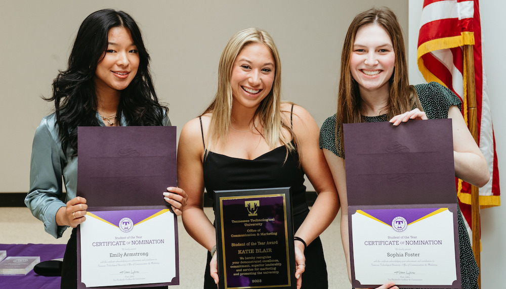 OCM Student of the Year Nominees and Winner posing with awards.