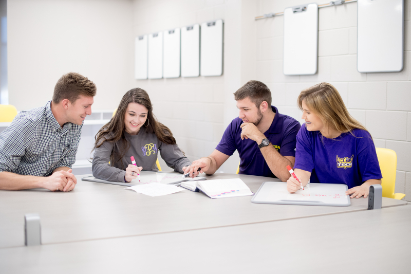 students around a table